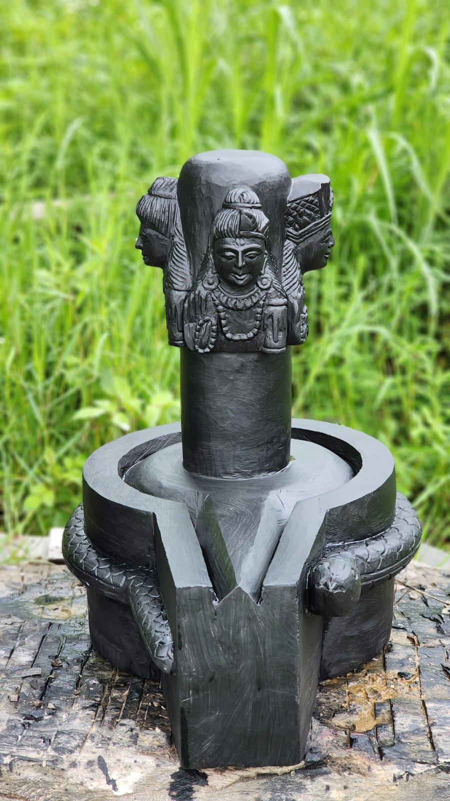 Invite the divine blessings of Lord Shiva with this handcrafted Chaturmukhi Shiva Lingam made in Nepal. Expertly carved from premium black stone, it features four beautifully sculpted faces of Lord Shiva, making it an ideal centerpiece for temples, home shrines, and meditation spaces.